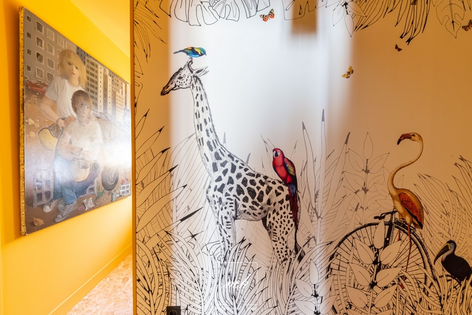 Fresque jungle au sein d'un duplex situé à Mers-les-Bains pensé par MH DECO