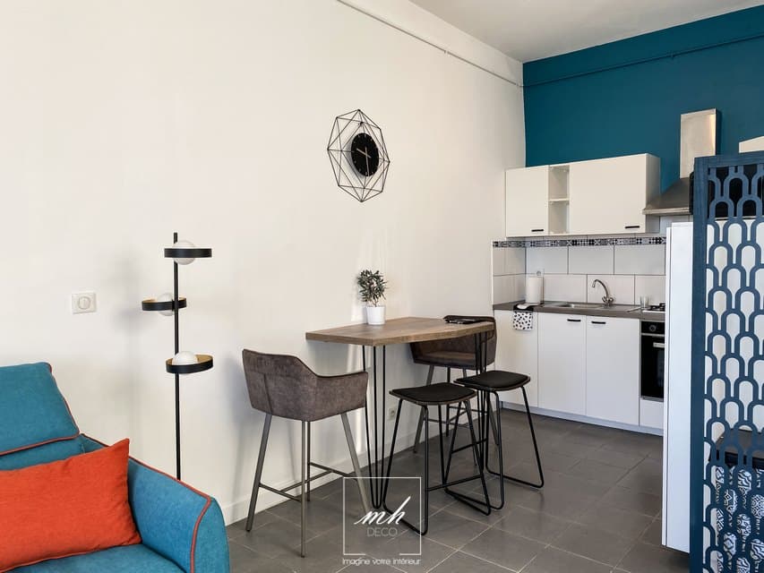 Agencement de la partie cuisine au sein d'un appartement situé à Sète par MH DECO